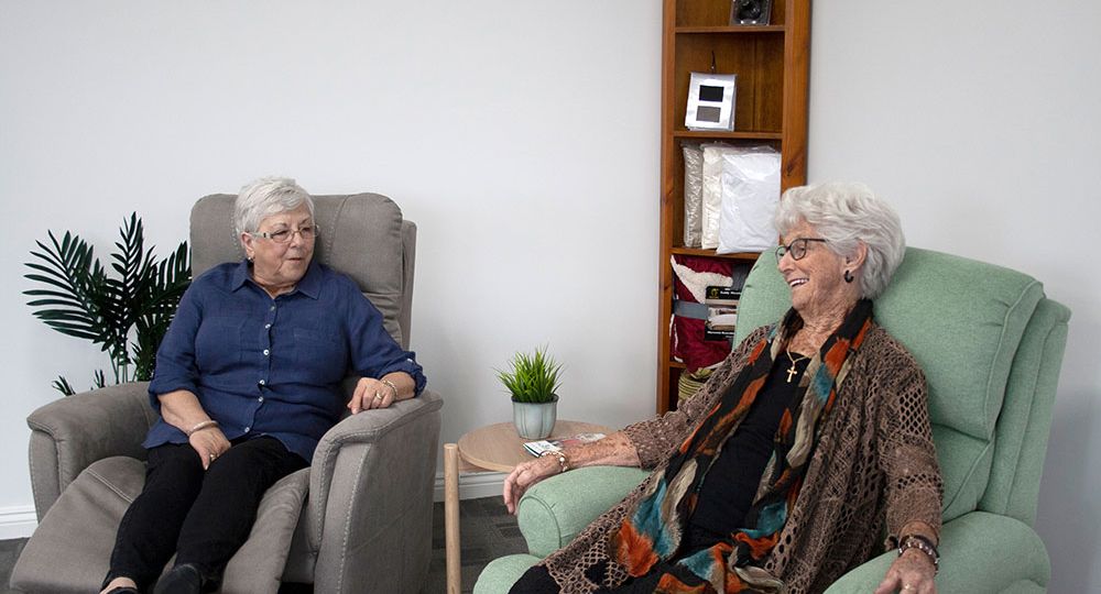 older friends laying in recliners